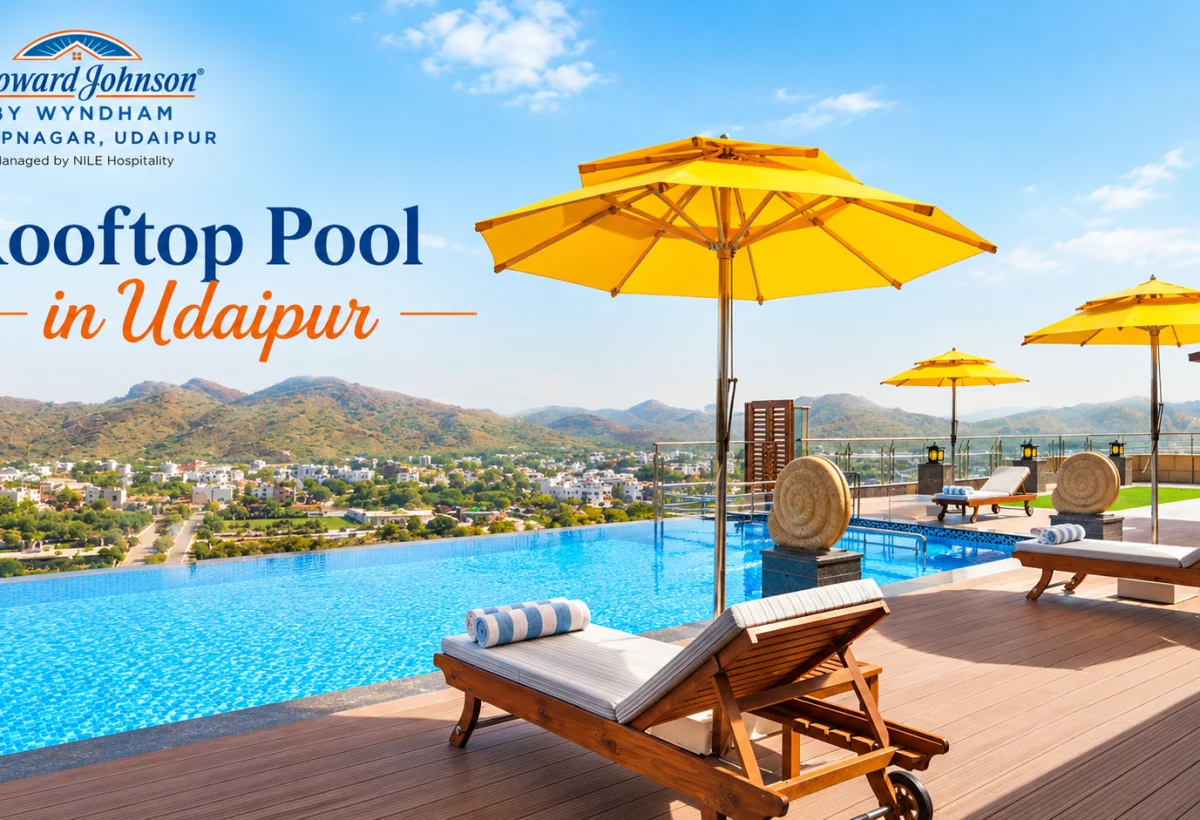 Rooftop pool in Udaipur with comfortable seating and scenic views
