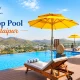 Rooftop pool in Udaipur with comfortable seating and scenic views